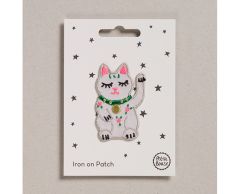 Hvit lykkekatt strykemerke